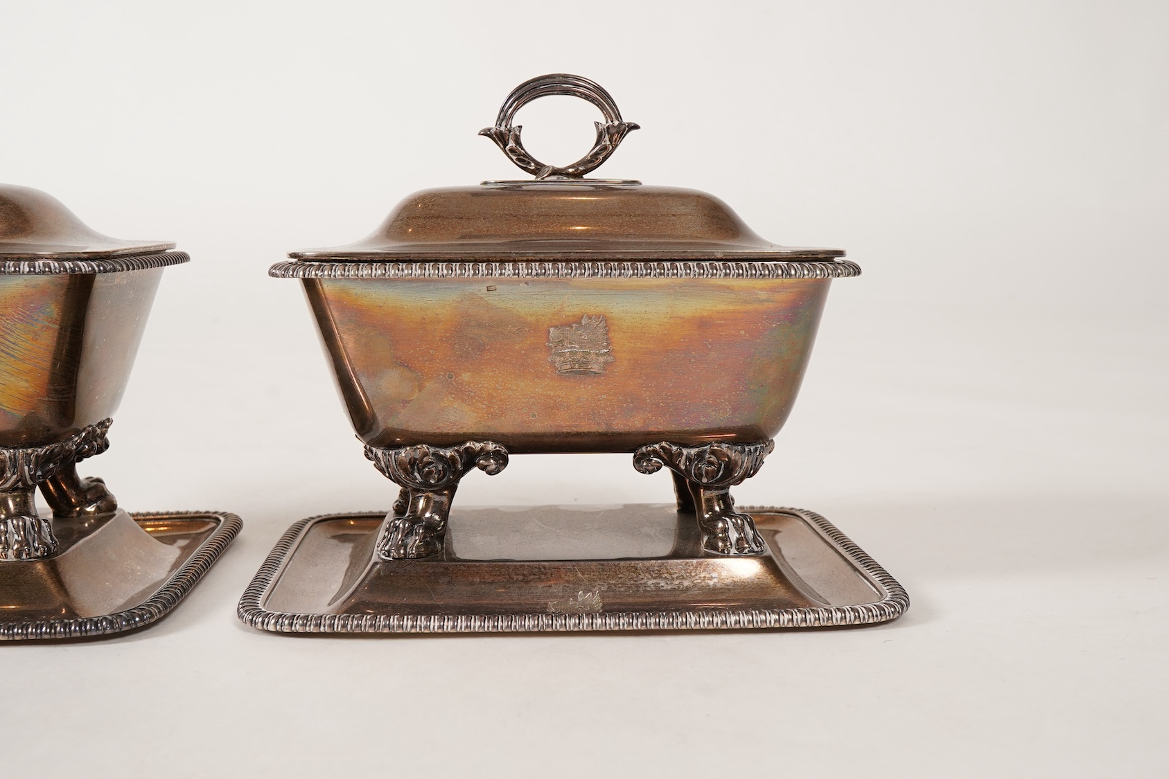A pair of George IV silver sauce tureens with covers and integral stands, by Philip Rundell
